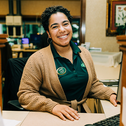 Staff member smiling